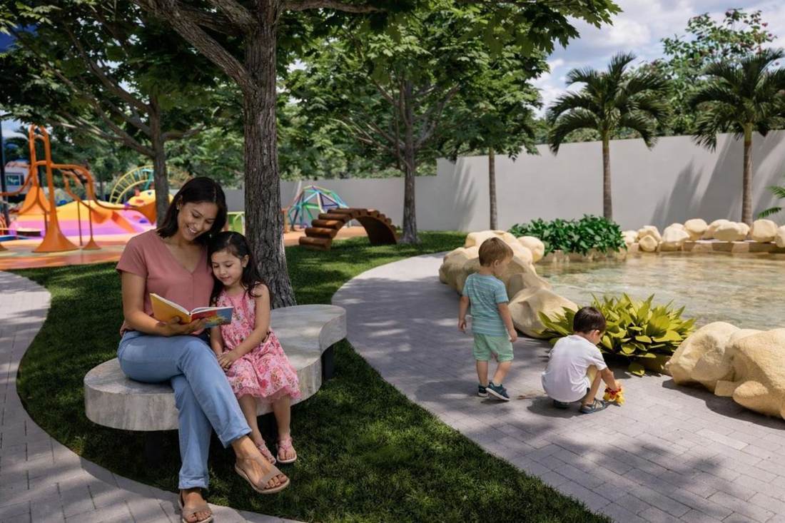 Mae e filha lendo em ambiente acolhedor do IMAPA